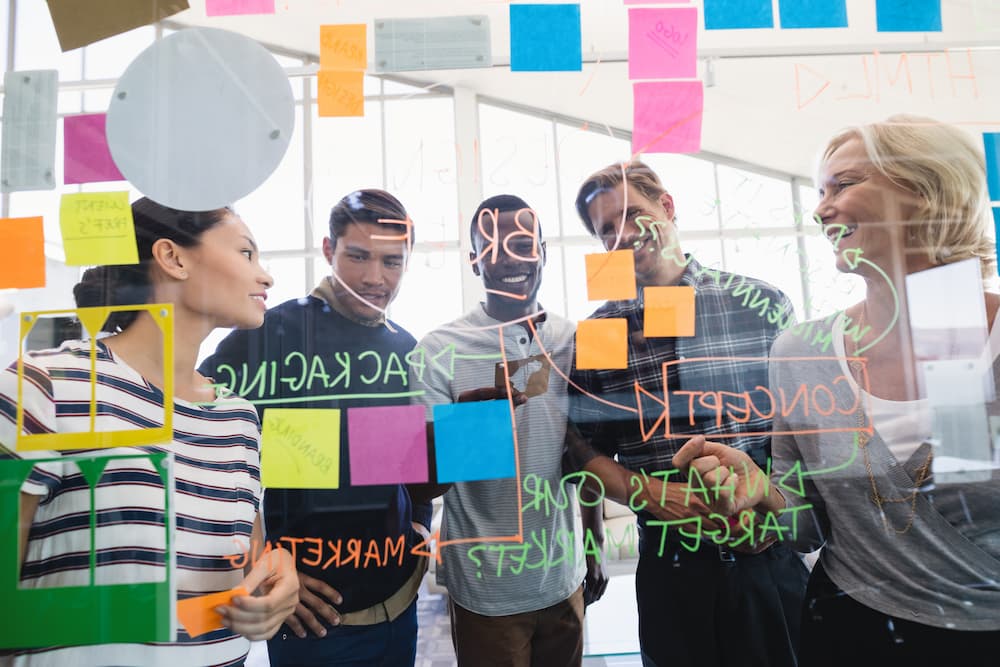 A sales team brainstorming about sales and marketing solutions.